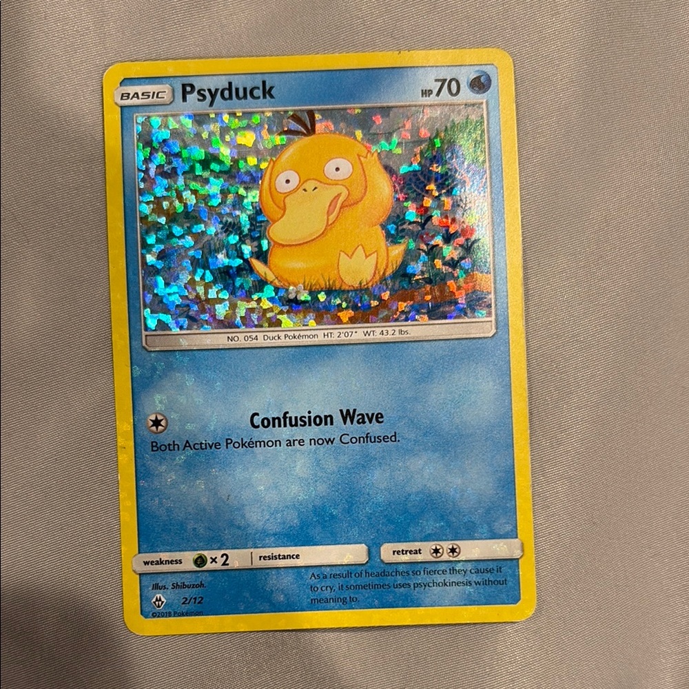 Pokemon Psyduck Holographic Card Bundle